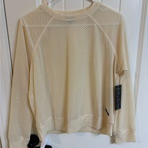 Long sleeve Bebe netted top.